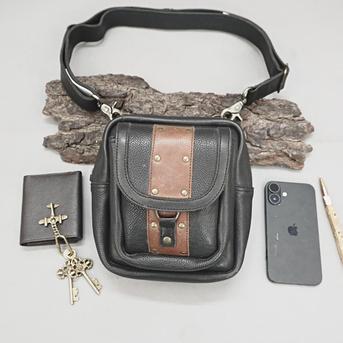 Artisan leather waist belt bag with flap closure and rivet details