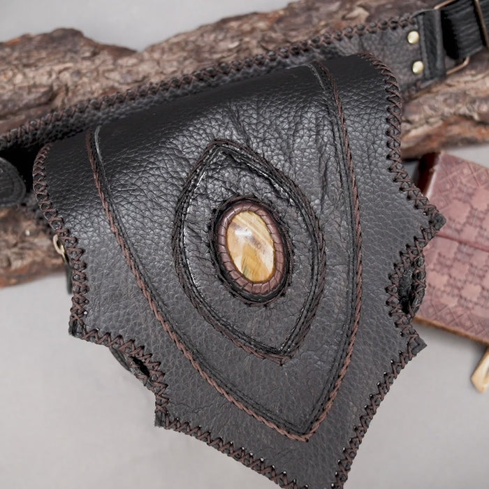 Tribal style leather hip pouch with oval stone inlay