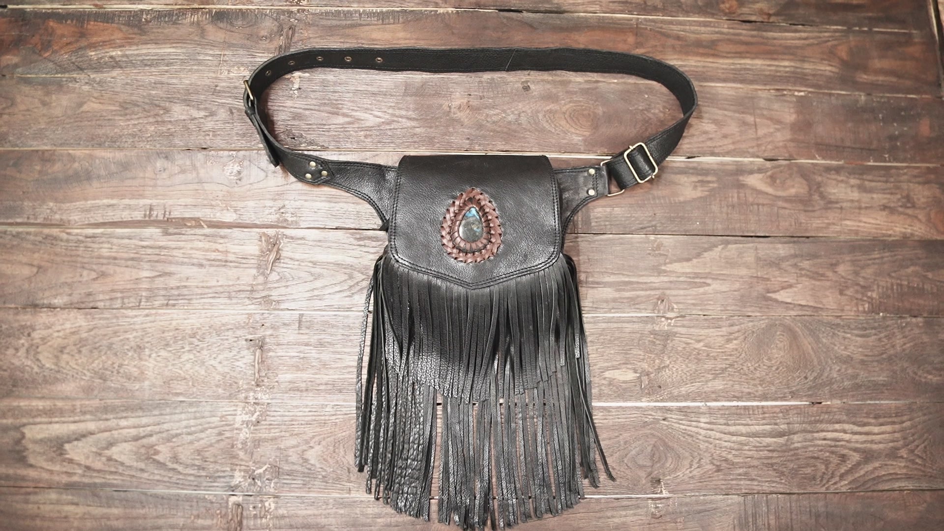 black fringe leather holster waist bag with gemstone accent flap
