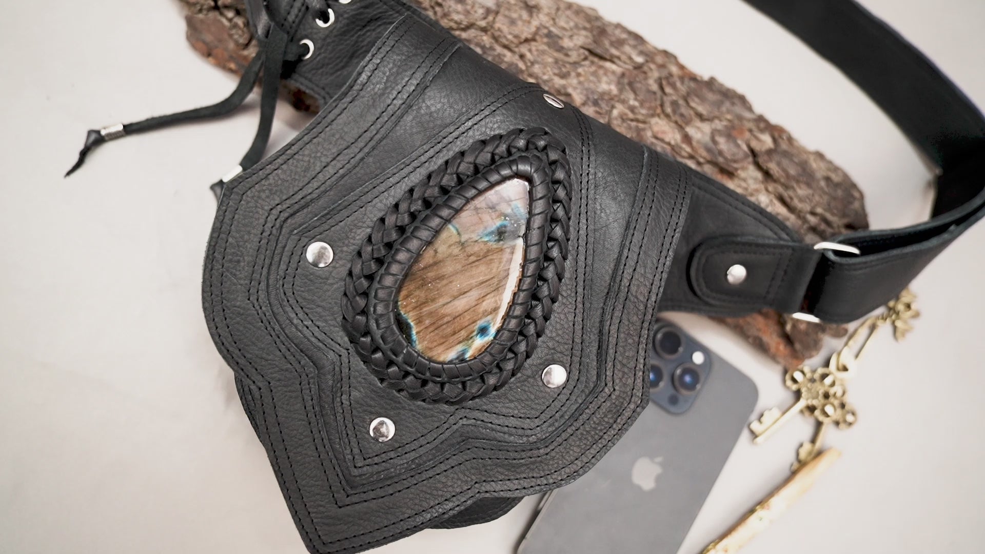 Handmade leather waist belt featuring braided stone detailing