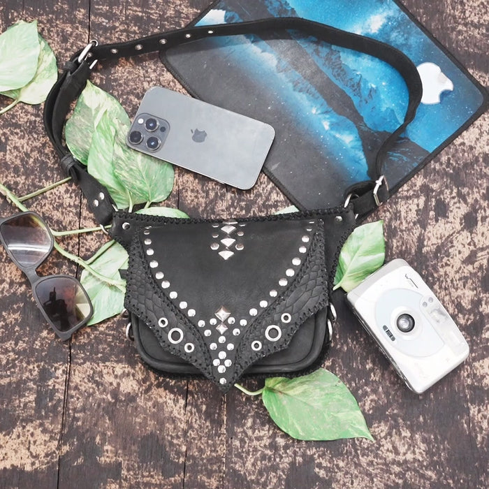 Handmade leather hip pouch with metal accents