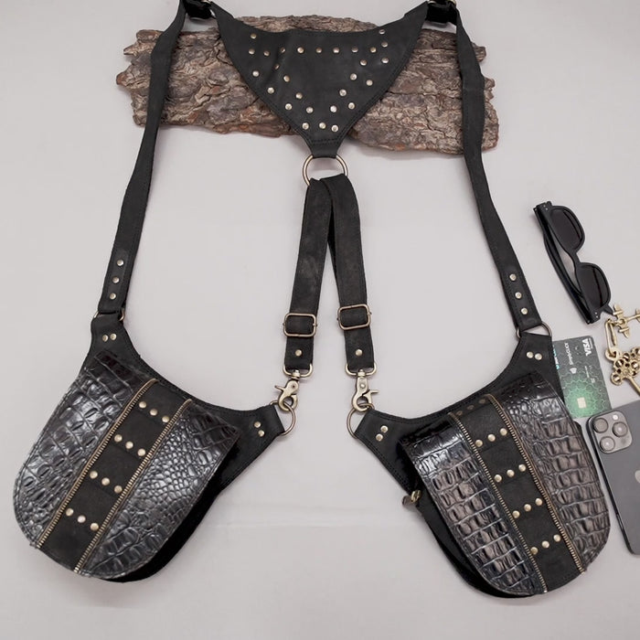 Studded leather shoulder rig with embossed holster pockets