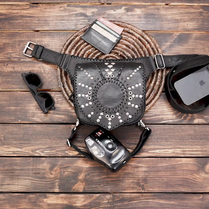 Front view of gothic black leather hip holster bag for festivals