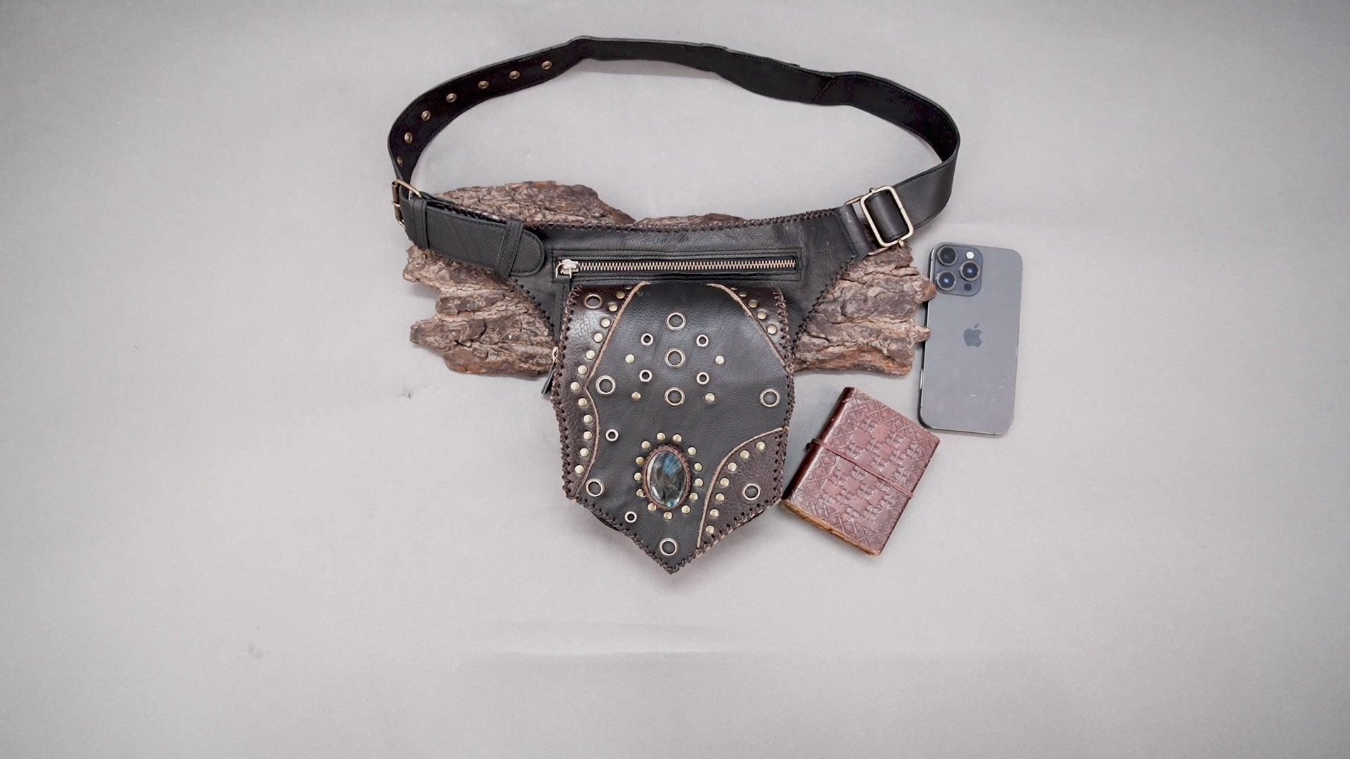 Artisan leather waist belt bag with studded detailing and zipper pocket