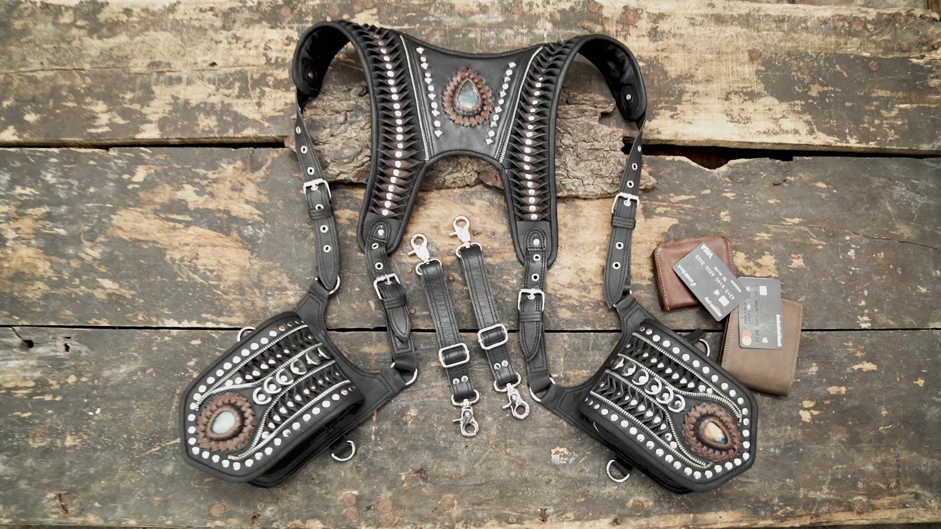 Handmade leather holster with detailed studwork and natural stone centerpiece