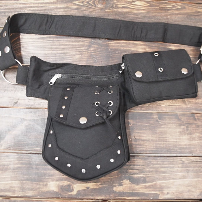 Close-up of lace-up design on cotton waist bag front pocket