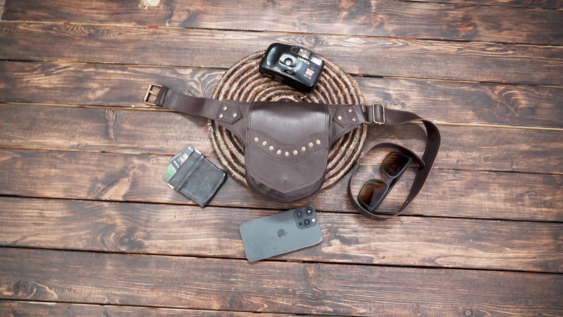 Handmade leather hip pouch with decorative metal studs