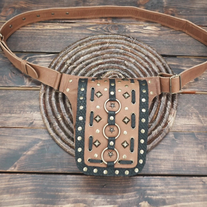 Premium brown leather belt with black detailing and brass rivets.