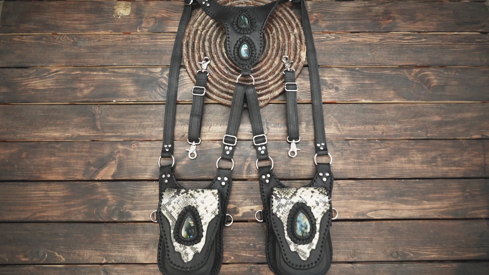 Fantasy style black leather harness holster with gemstone accents