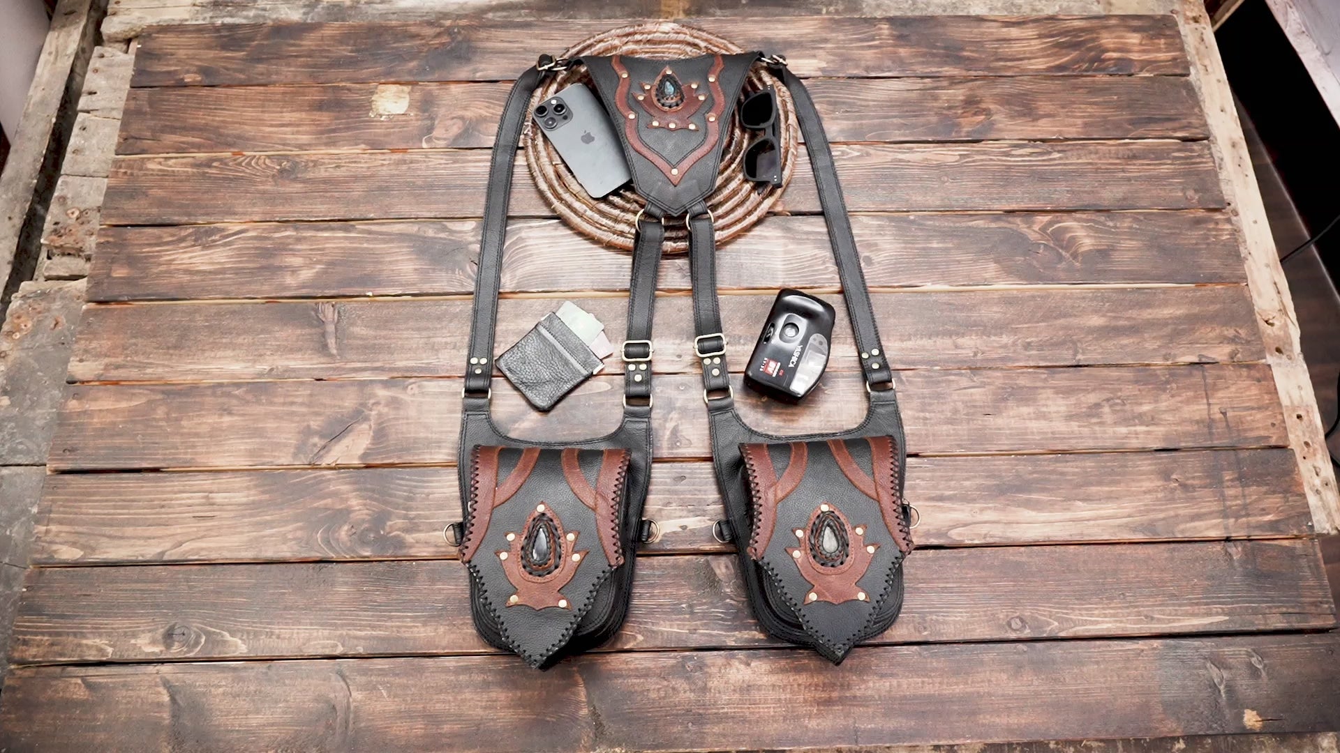 Western gothic leather holster bag displayed on mannequin