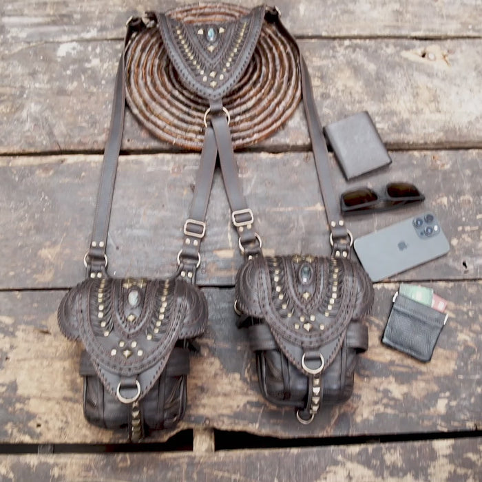 “Handcrafted brown leather festival holster with layered flap and brass studs”