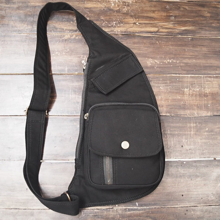 Gothic streetwear underarm sling purse with snap button pocket.