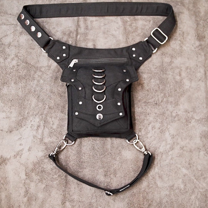 Adjustable black utility waist pouch with metal hardware.
