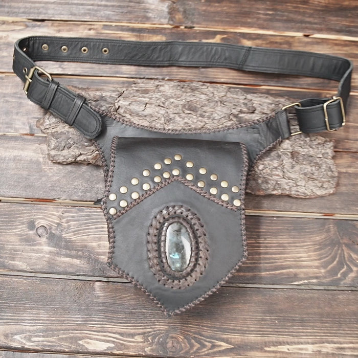 Black leather utility belt with boho design and brass accents