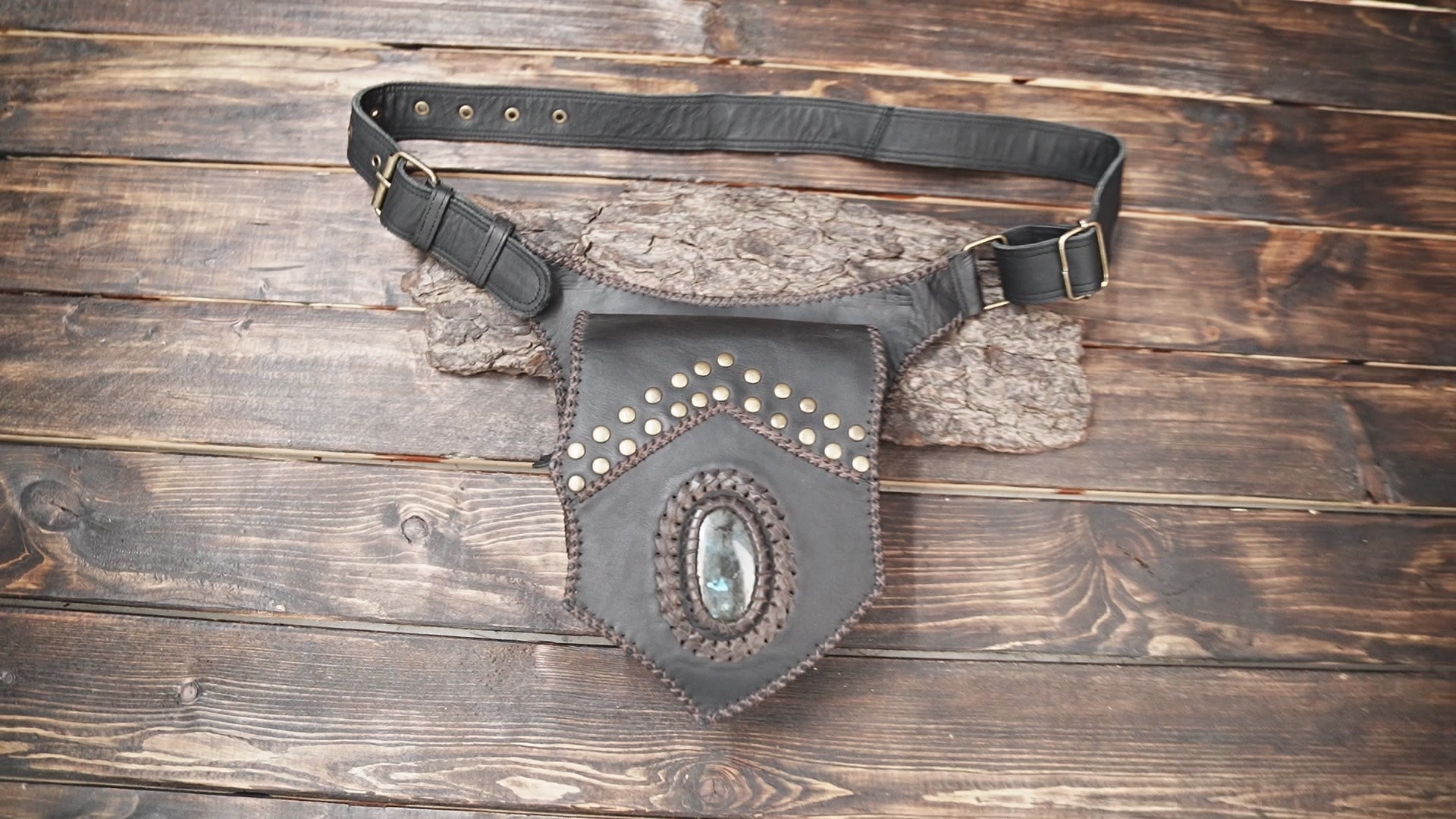Black leather utility belt with boho design and brass accents