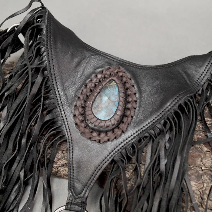 Steampunk-inspired fringe leather holster with natural stones
