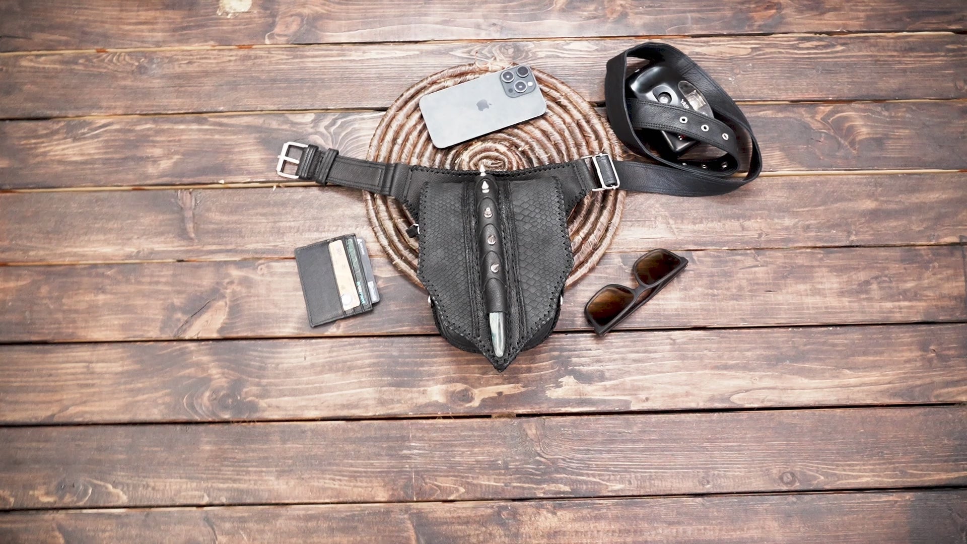 Handmade leather waist belt with textured leather and metal studs