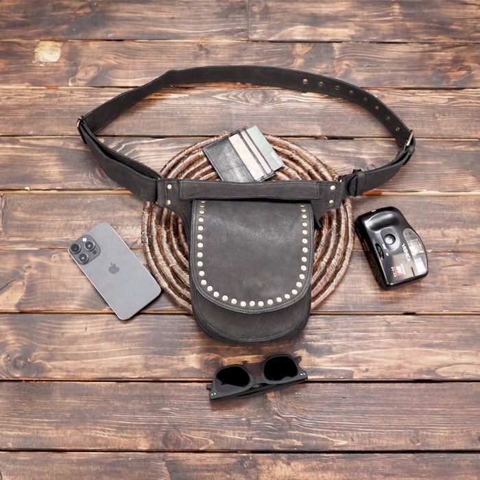 Leather waist belt featuring a single pouch with flap closure