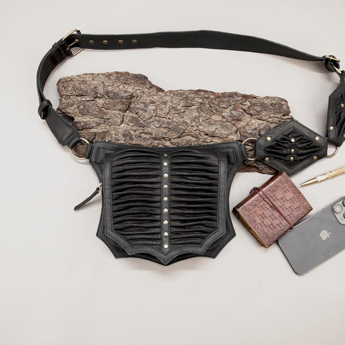 Leather waist belt featuring textured pleated leather design