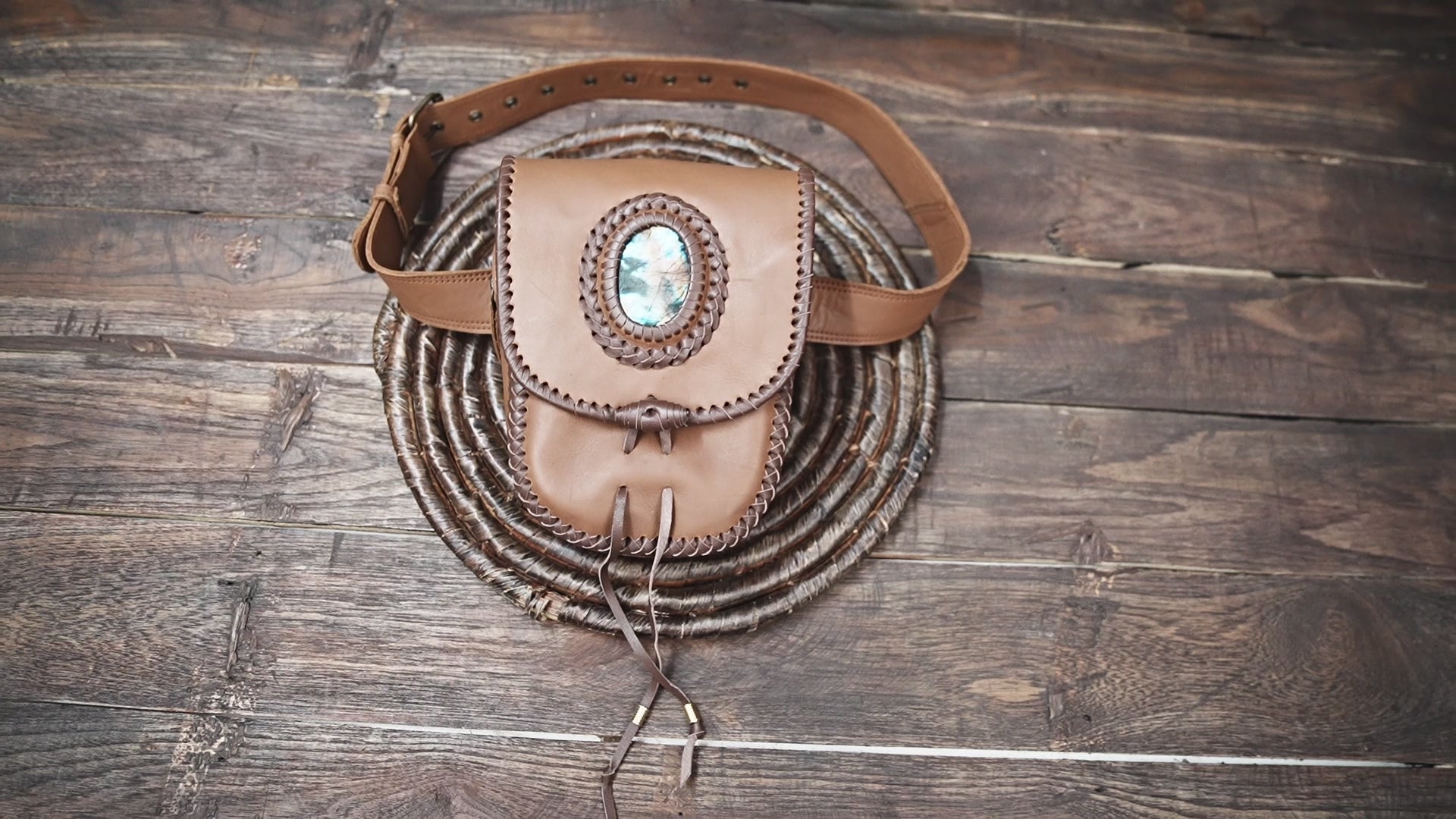 Genuine leather waist belt pouch with secure flap closure