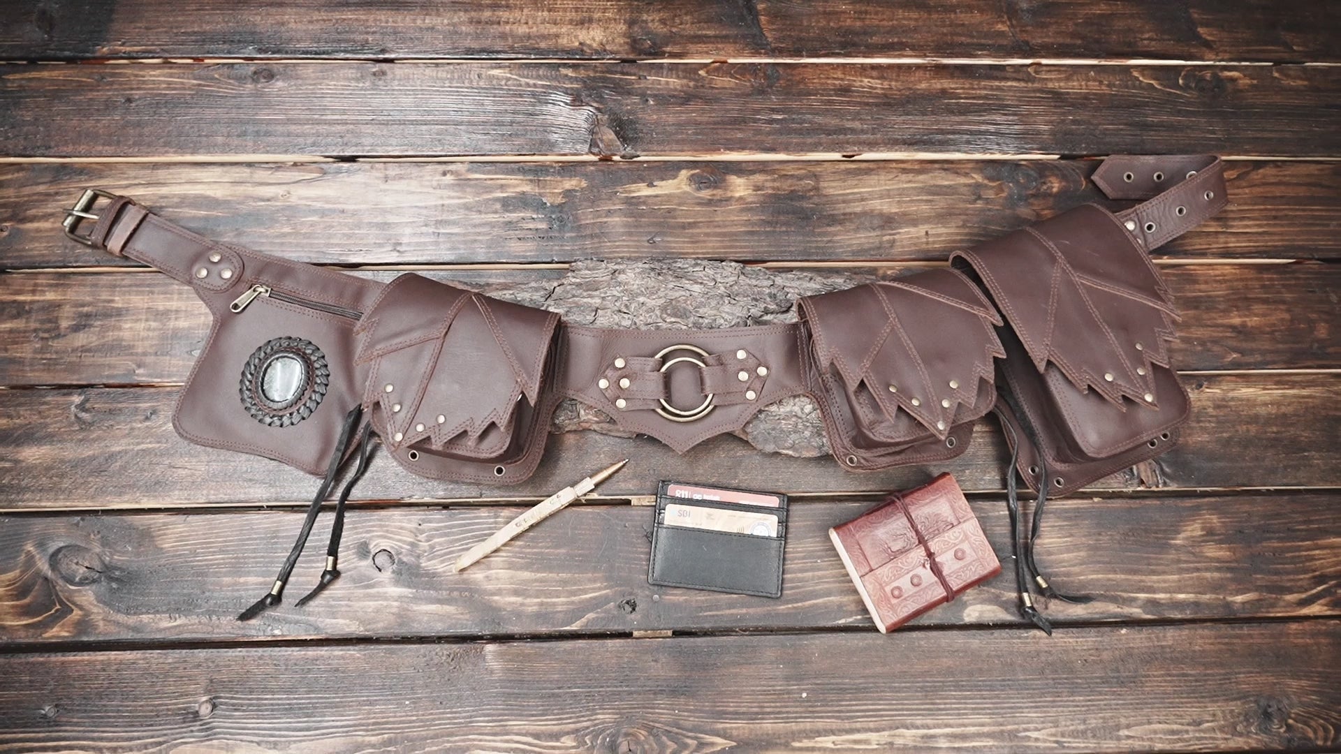 Handmade brown leather festival belt with rustic pouch design