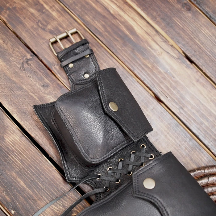 Western-style black leather hip pouch with dual pockets and rivet detailing