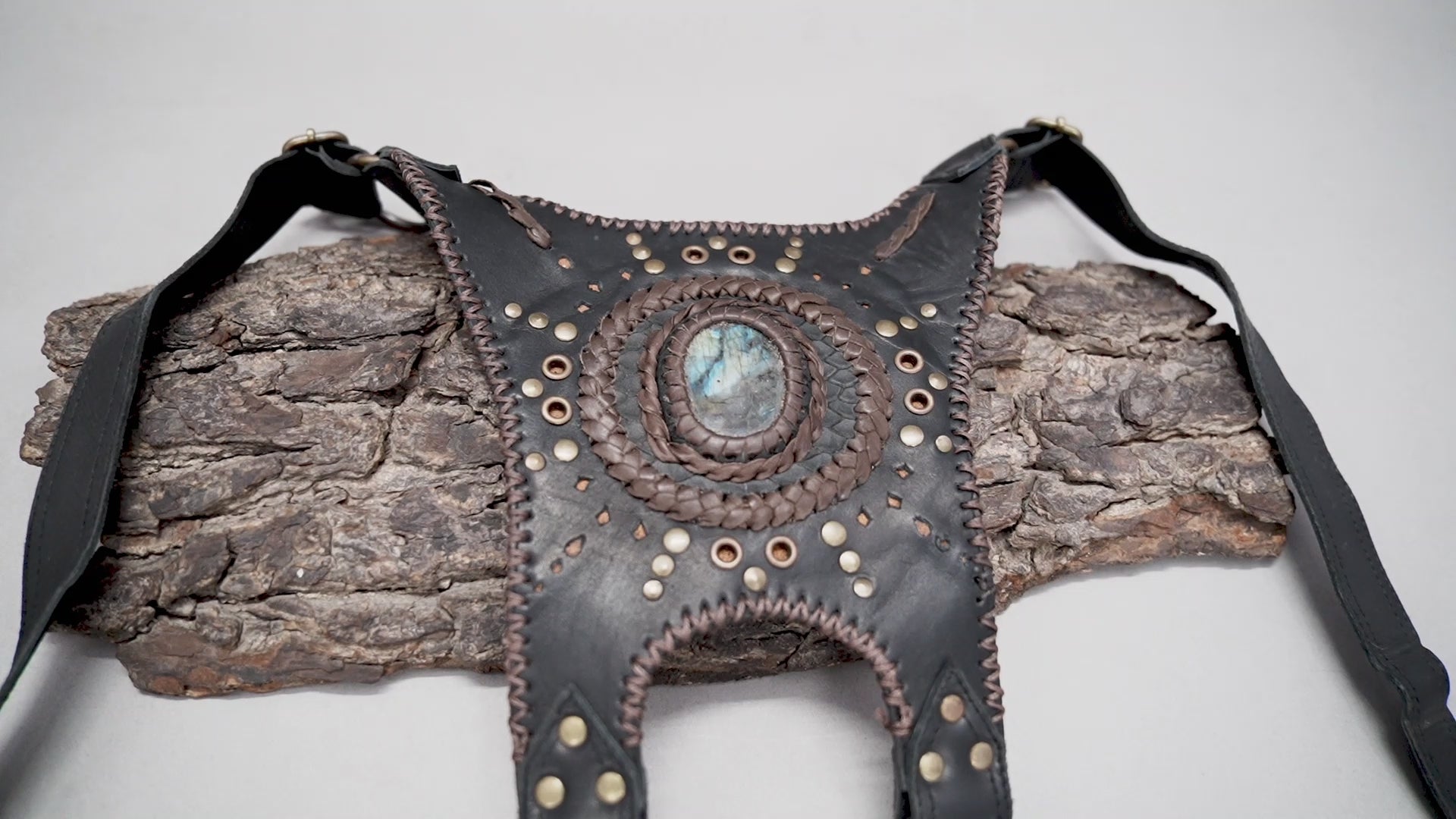 Handmade leather shoulder holster with natural stone centerpiece