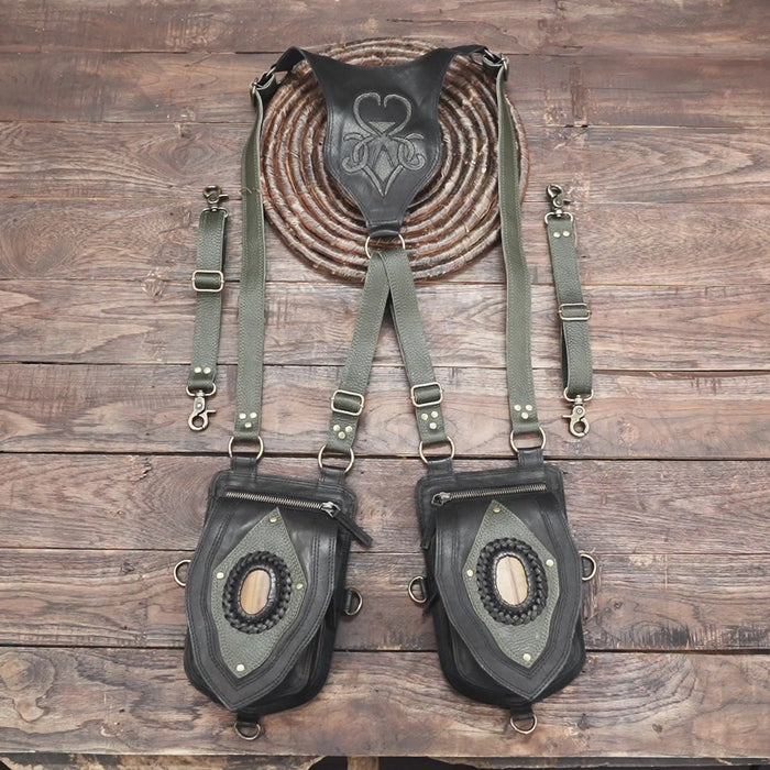 Handmade leather holster bag with green straps and oval stone detail