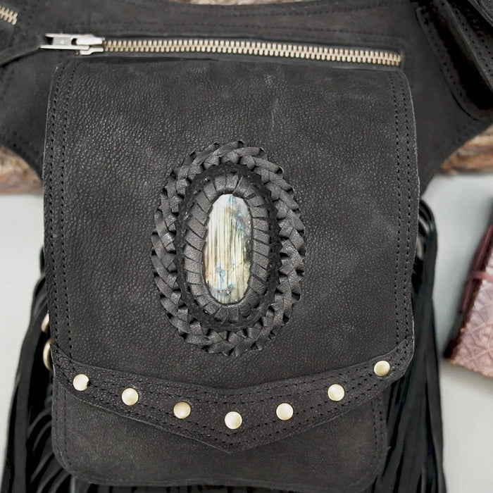 Boho leather waist belt bag with fringe detailing and zip pockets