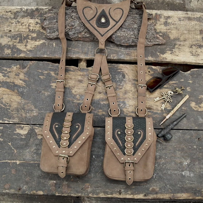 leather holster harness with embossed pattern and antique hardware