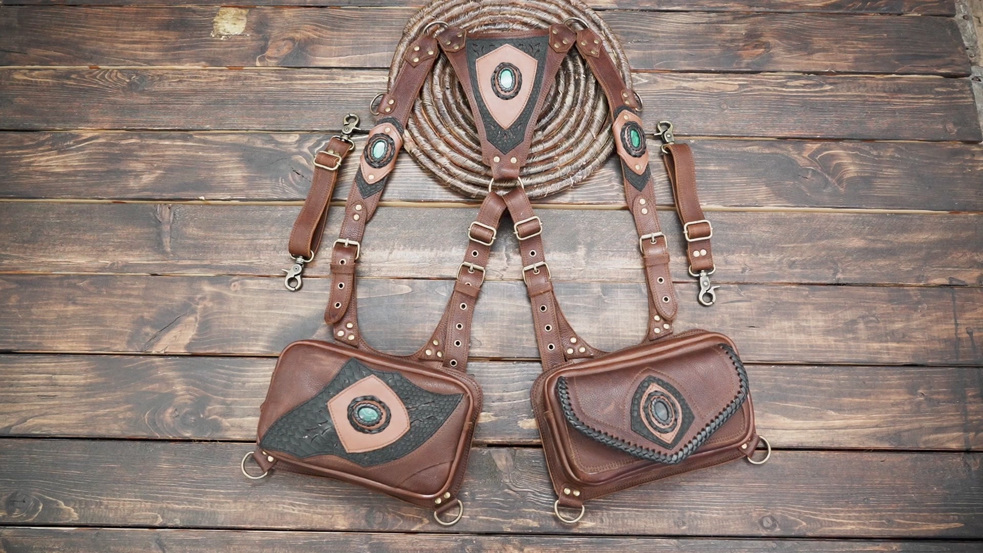 Close-up of gemstone detail on brown leather holster bag