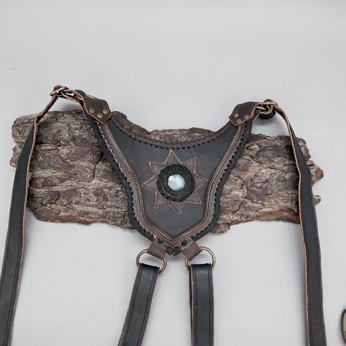 Premium black leather holster harness with stone centerpiece