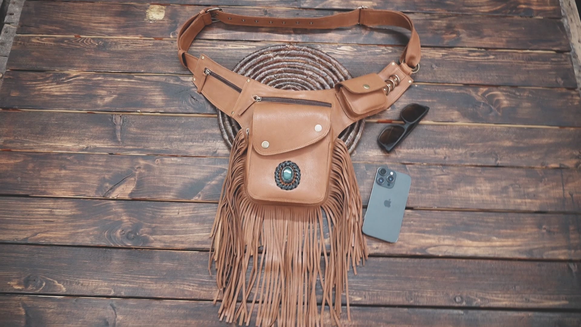 Boho leather waist belt bag with long fringe and utility pockets